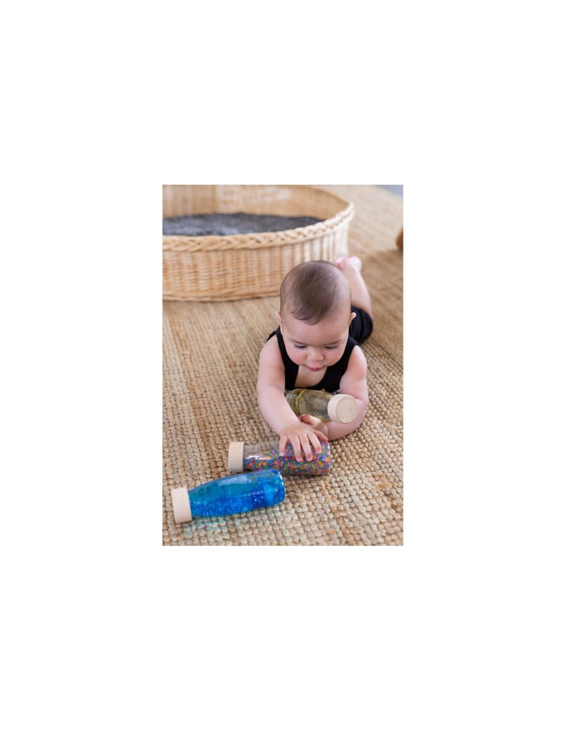Bouteille sensorielle bébé Sound 'Boutons' Petit Boum - Dröm Design